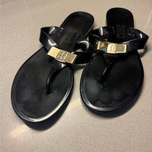 Salvatore Ferragamo Black Sandals with Gold Bow